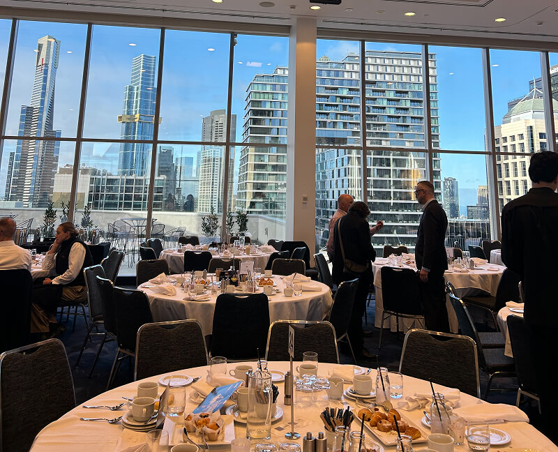 A photo of the view from the WorkSafe Breakfast showing skyscrapers outside the windows
